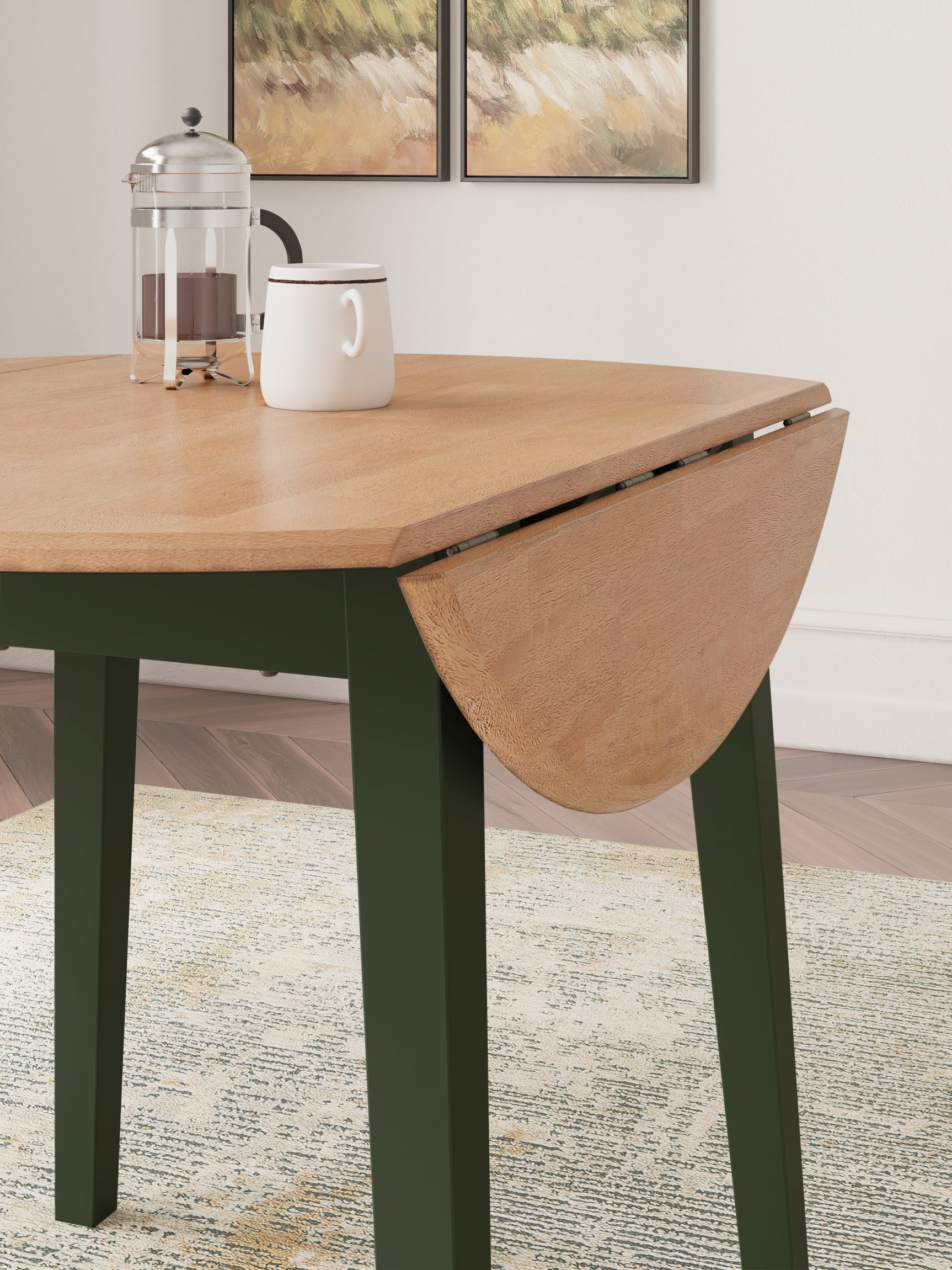 Detail of natural mango wood and green finish on Gesthaven table
