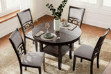 Styled setting of Langwest brown round dining table with chairs