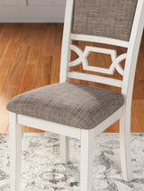 Detail of light gray textured upholstery on dining chair