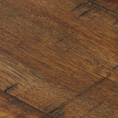 Two-tone distressed brown and gray finish on Torjin table