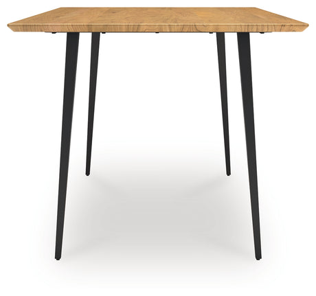 Side view of Gretlynn dining table emphasizing natural wood finish