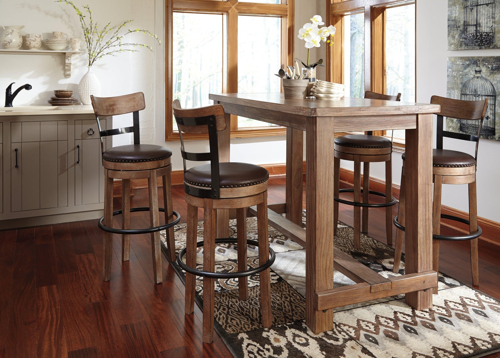 Side view of Pinnadel Light Brown Bar Stool showing seat cushion