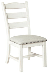 Valebeck dining chair side angle showing distressed white frame