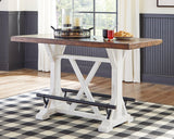Barstools arranged around Valebeck counter height dining table