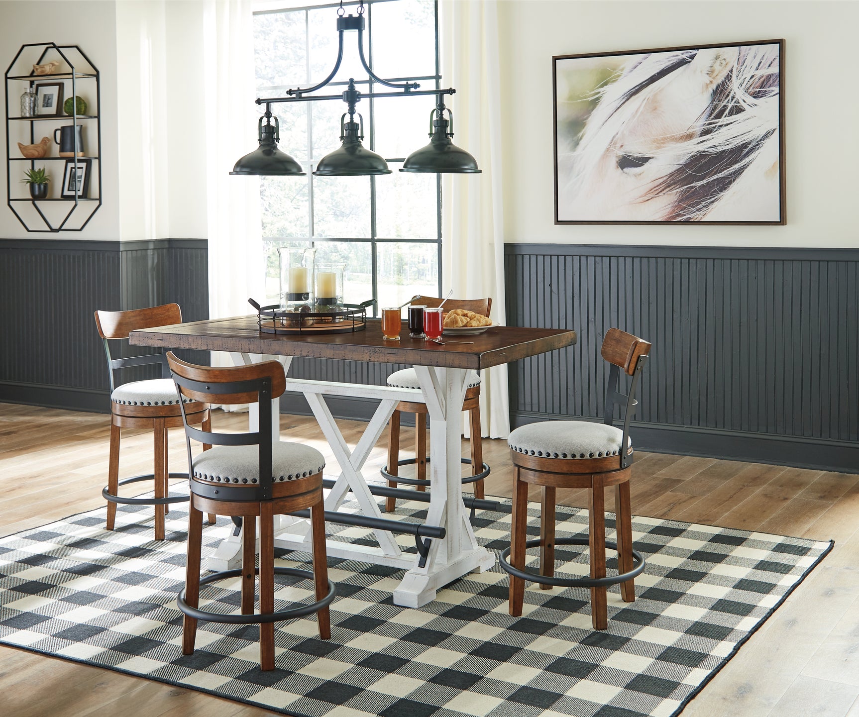 Black metal footrest detail on Valebeck dining table