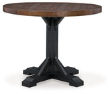 Valebeck dining table pedestal base detail in rustic black finish