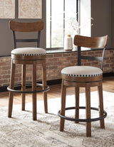 Valebeck brown bar height swivel bar stool together with other Valebeck stools and tables