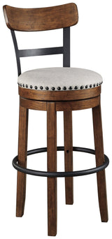 Valebeck brown bar height swivel bar stool close-up side view