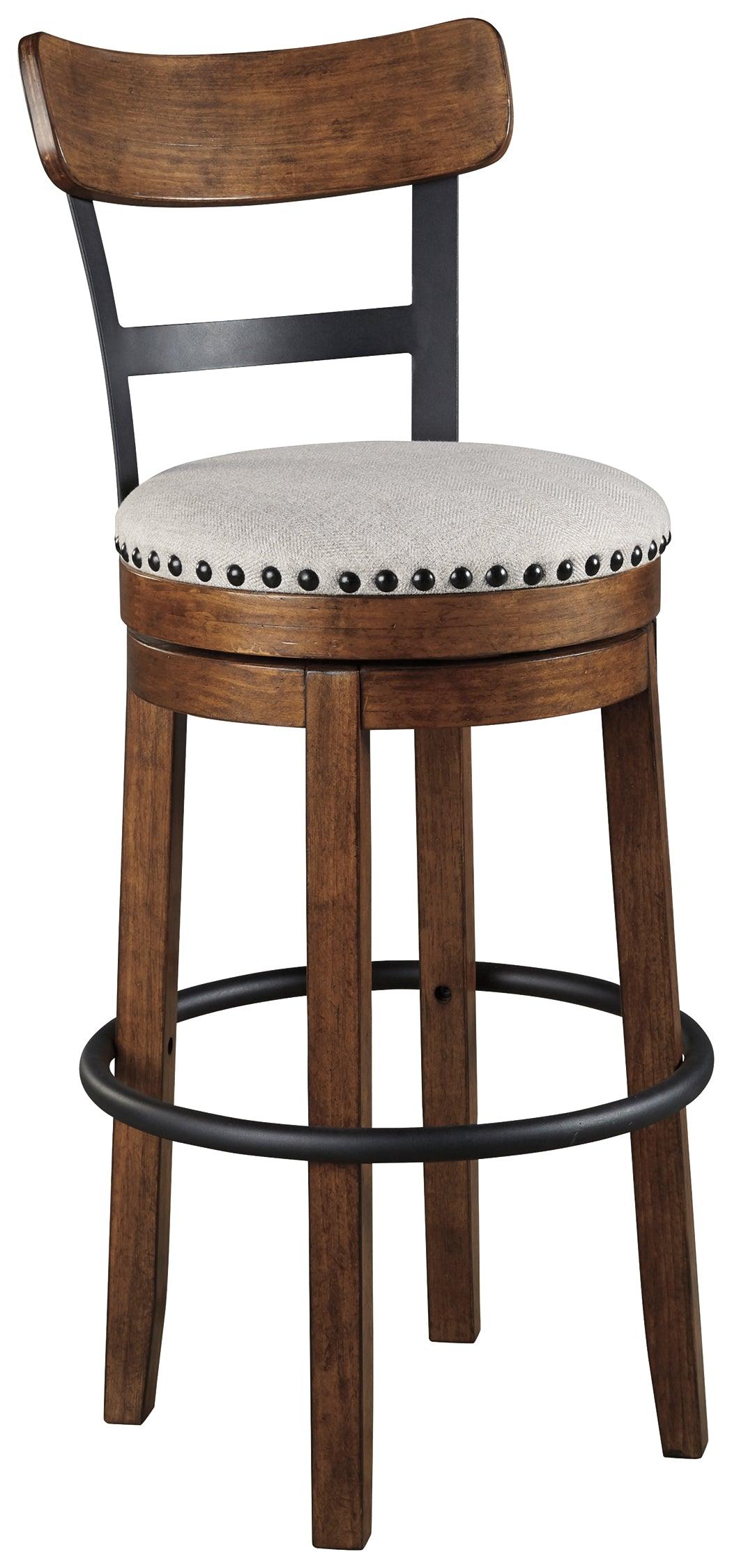 Valebeck brown bar height swivel bar stool close-up side view