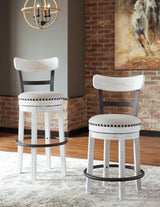 Pair of Valebeck Bar Stools showcasing vintage white finish and cushioned seats