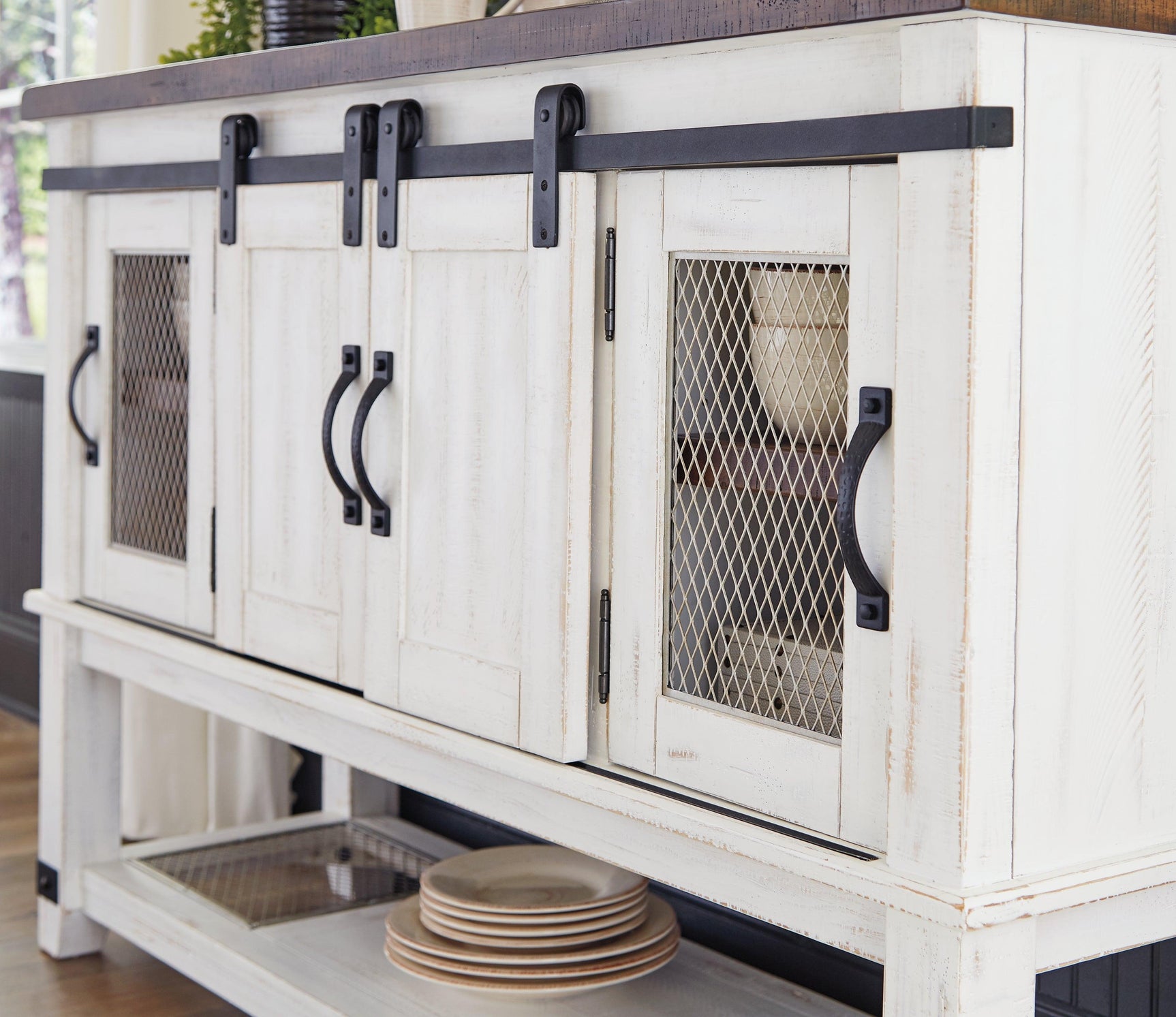 Close detail of wire mesh inlay on Valebeck dining server door