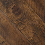 Front angle of Valebeck dining table and barstools set featuring rustic farmhouse style