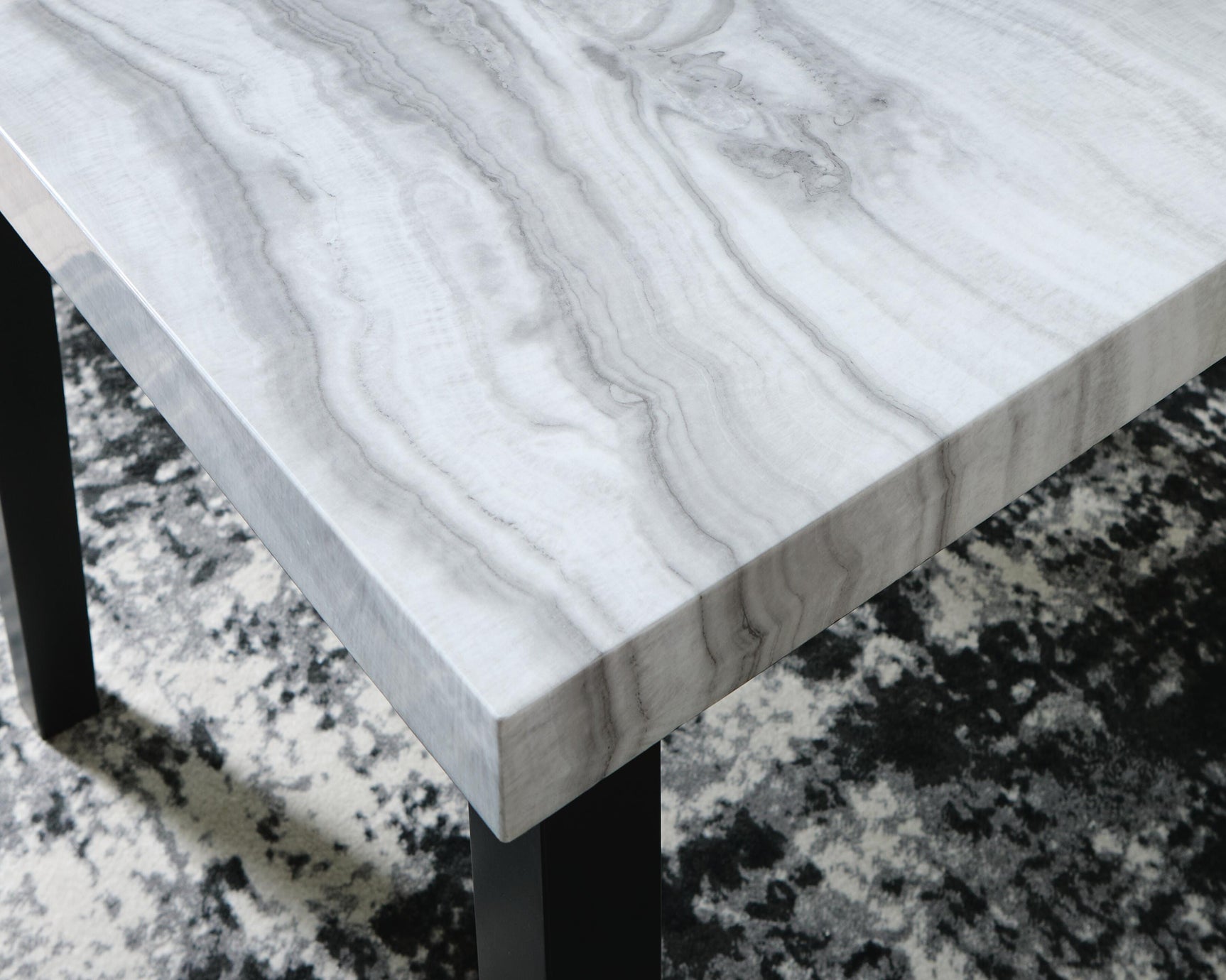 Close-up of faux gray marble tabletop on Mervannie dining table
