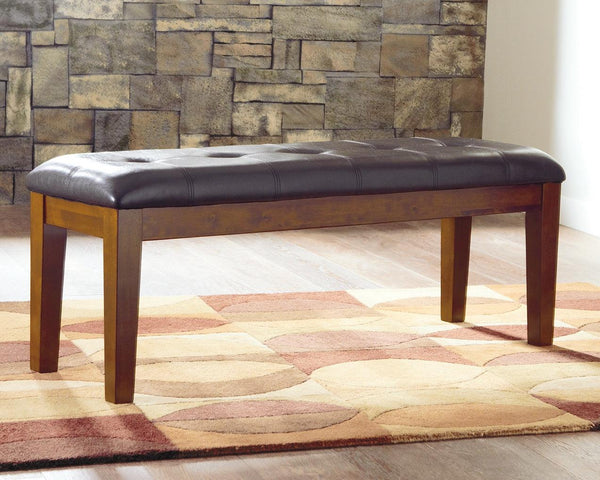 Ralene dining bench medium brown faux leather seat angled front