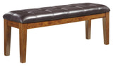 Ralene dining bench side view showing plush upholstery