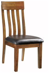 Ralene Medium Brown Upholstered Dining Chair angled view
