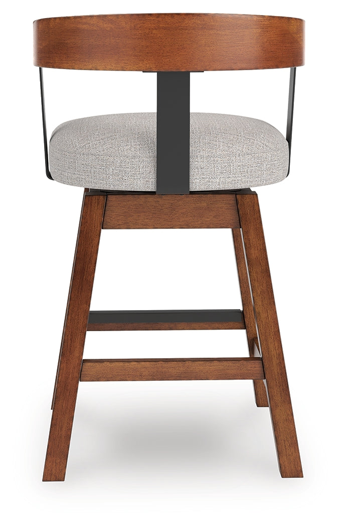 Back view of Ralene barstool highlighting burnished wood finish