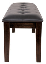 Haddigan Dark Brown Upholstered Dining Bench close-up of wood legs