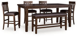 Side view of Haddigan dark brown dining table leaf detail