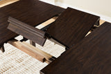 Leaf extension detail of Haddigan dark brown dining table