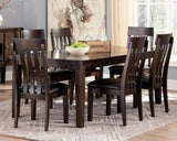 Haddigan dining extension table angled side view in dark brown finish