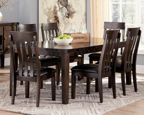 Haddigan dining extension table angled side view in dark brown finish