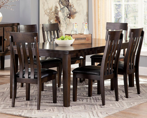 Haddigan dining extension table angled side view in dark brown finish