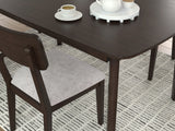 Close-up detail of chair upholstery and wood finish