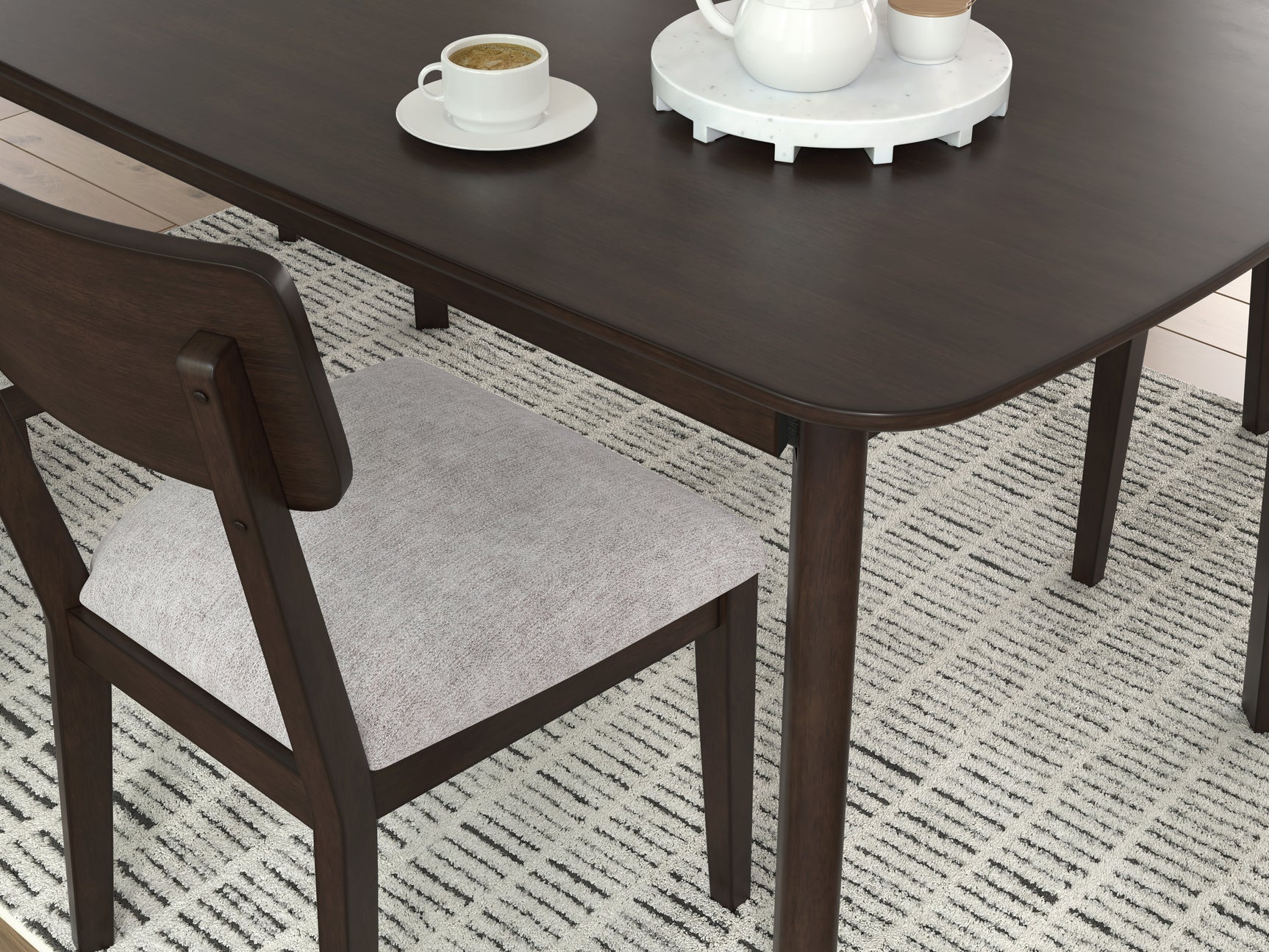Close-up detail of chair upholstery and wood finish
