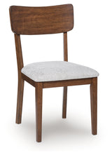 Angle of Tameride chair showing bent plywood backrest
