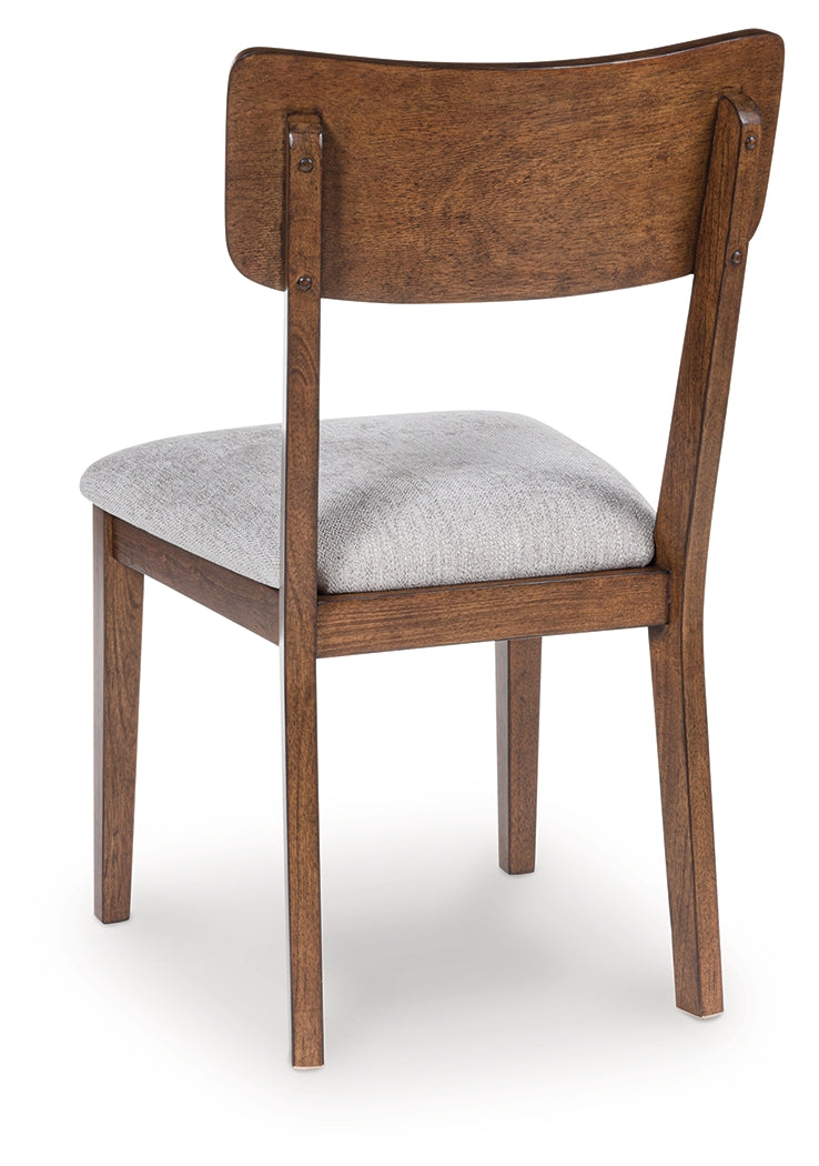 Close-up detail of Tameride chair upholstery and wood finish