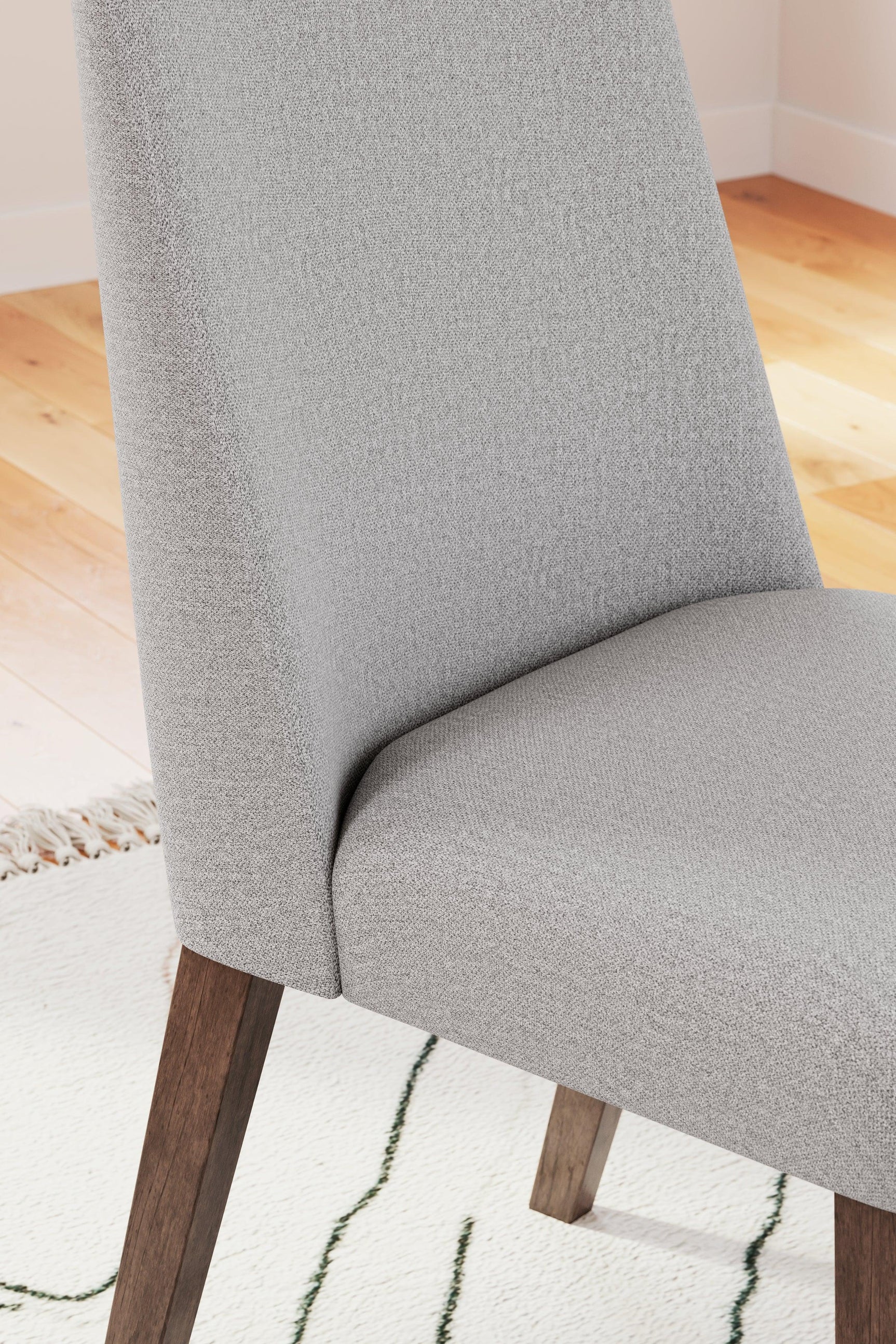 Lyncott Gray Brown Dining Chair close-up detail
