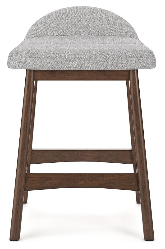 Side angle of Lyncott light gray and brown counter height bar stool showing seat contour