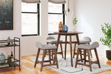 Lyncott counter height bar stool with focus on footrest and seat