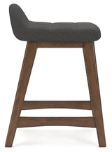 Close-up showing hardwood frame and upholstery