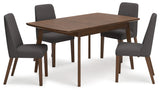Lyncott dining set styled in room