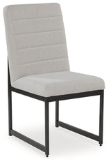 Tomtyn Light Brown dining chair angled side view showing upholstery