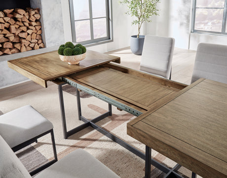 Tomtyn dining table showing self-storing leaf mechanism