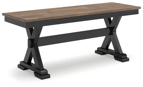 Side angle view of Wildenauer brown and black dining bench