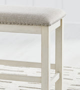 Robbinsdale antique white counter height dining table with barstools and storage bench