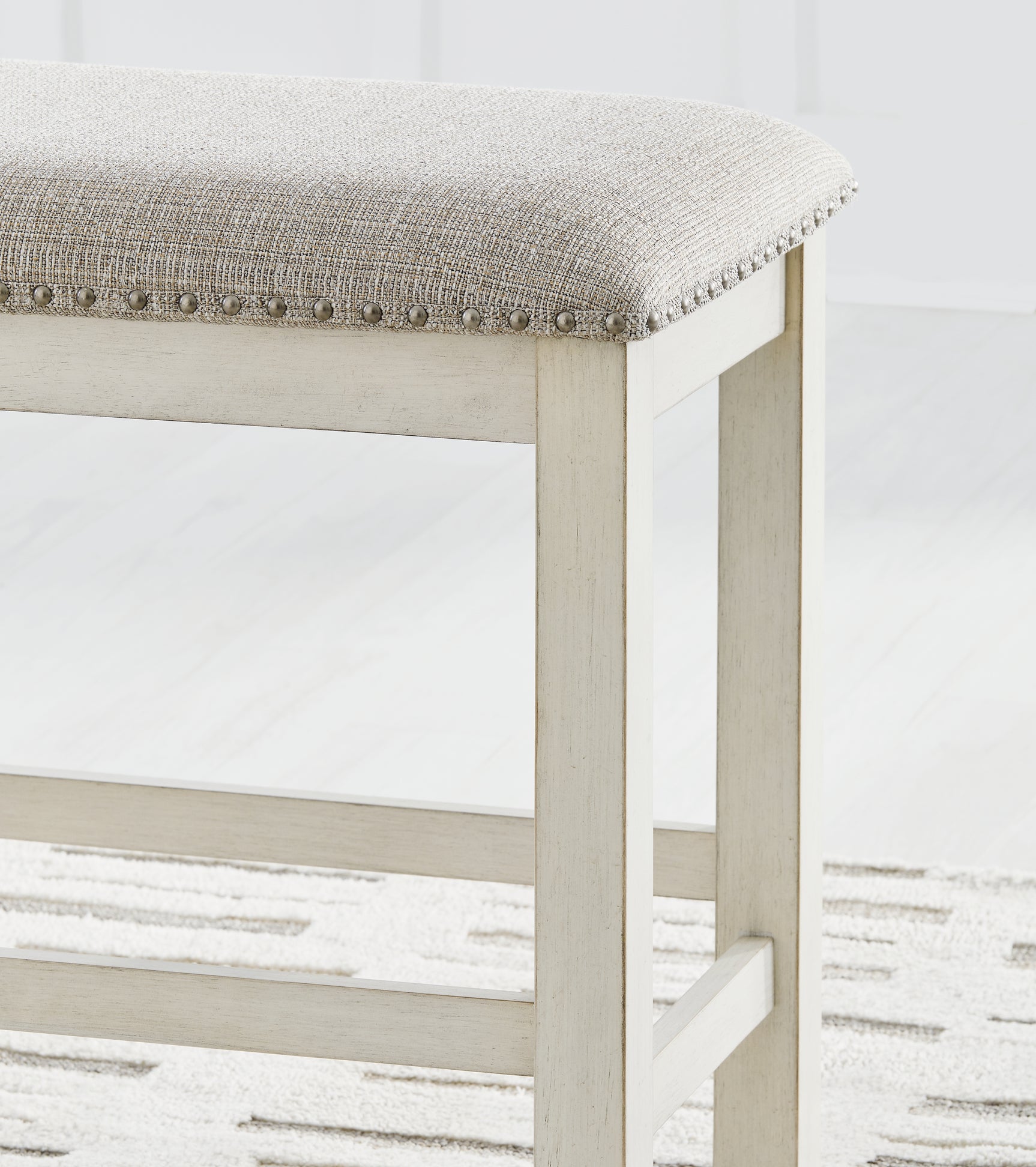 Robbinsdale antique white counter height dining table with barstools and storage bench