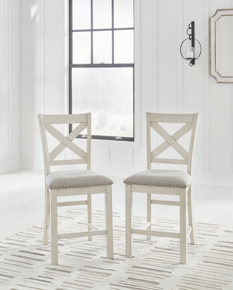 Robbinsdale Antique White counter height dining table set with six barstools