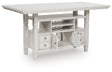 Robbinsdale Antique White Counter Height Dining Table angled open storage view