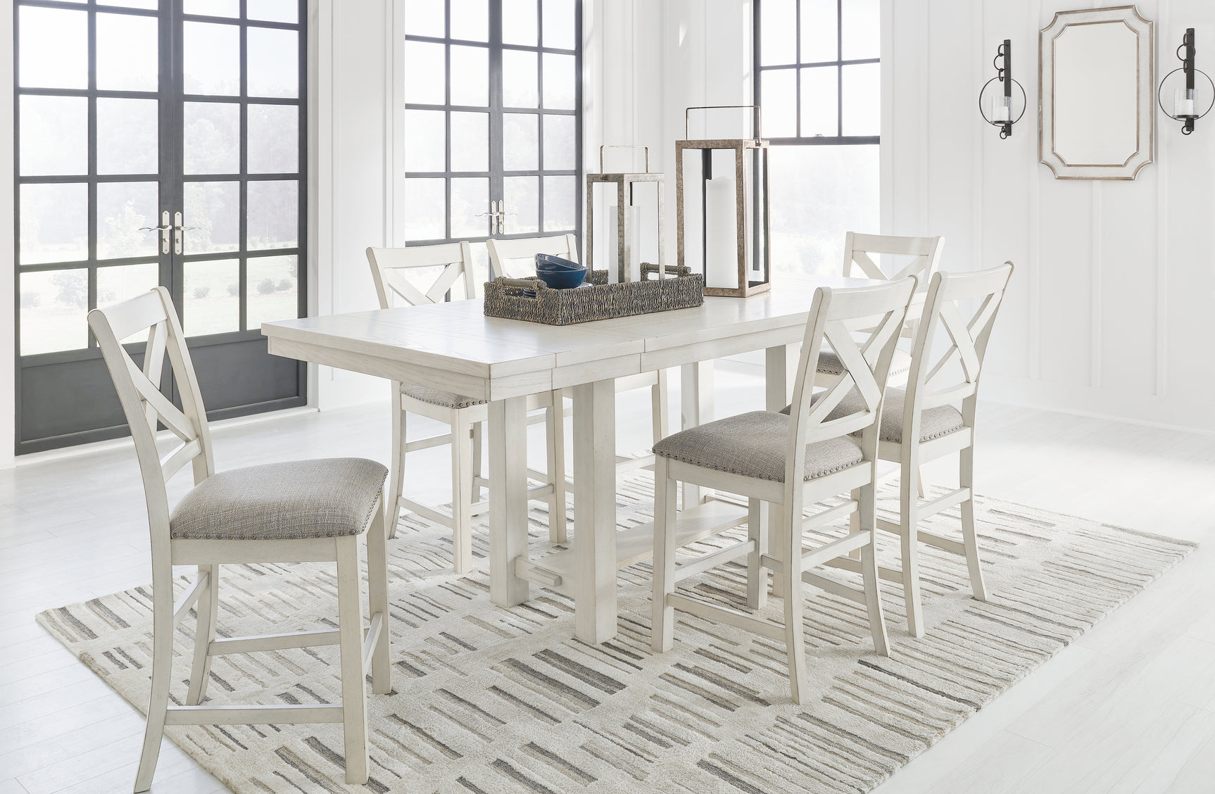 Side angle of Robbinsdale Antique White counter height dining table