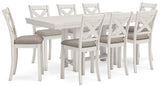 Light gray upholstered barstools arranged around Robbinsdale dining table