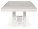 Side angle showing trestle base of Robbinsdale Dining Table