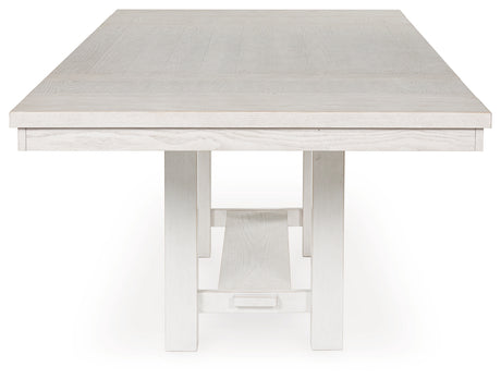 Side angle showing trestle base of Robbinsdale Dining Table