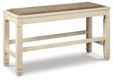 Angled view of barstools and bench with two-tone finish