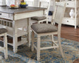 Bolanburg Two-tone Counter Height Bar Stool front angle with cushioned seat and antiqued white finish