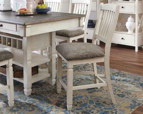 Bolanburg Two-tone Counter Height Bar Stool front angle with cushioned seat and antiqued white finish